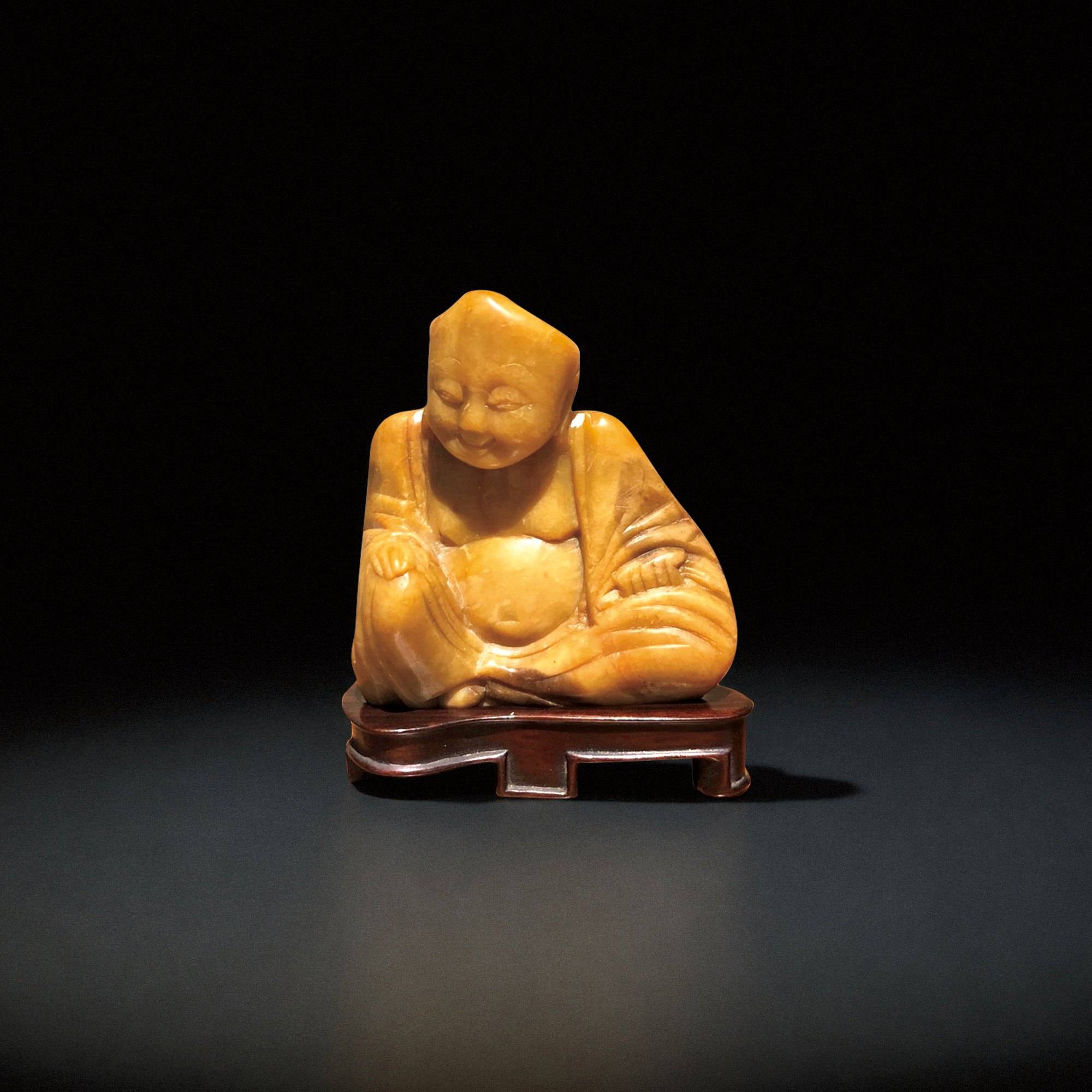 A Shoushan Stone Seal Carved with a Seated Luohan
